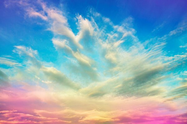 The sky with pink and blue iridescence in the clouds