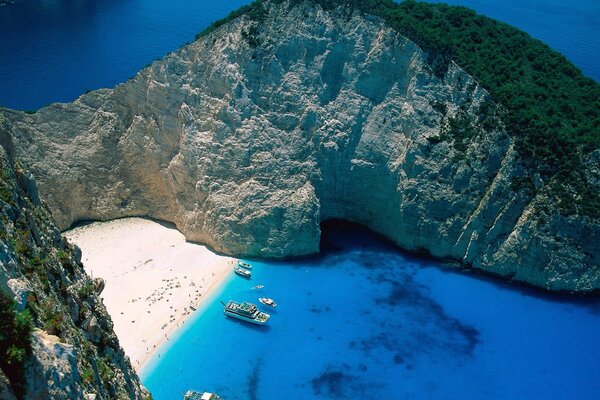 A calm harbor with a perfect beach