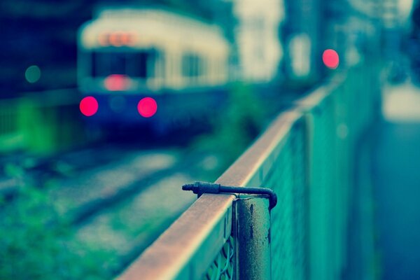 The train is approaching the platform early in the morning