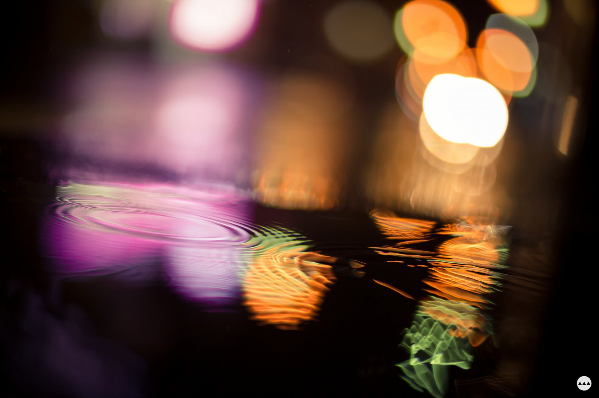 close up water reflections light bokeh