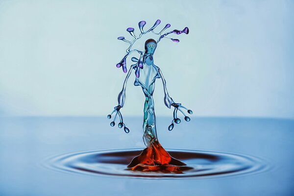 Splash of water in the form of a human figure