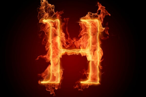 Burning letter h on a black background