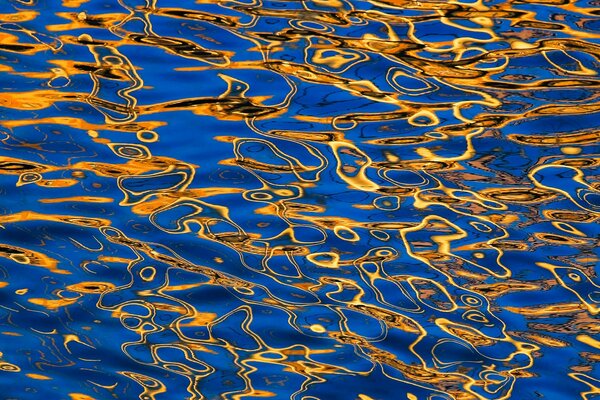 Yellow highlights on blue water