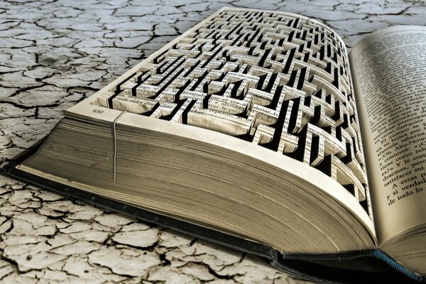 Abstract image of a maze inside a book in the desert