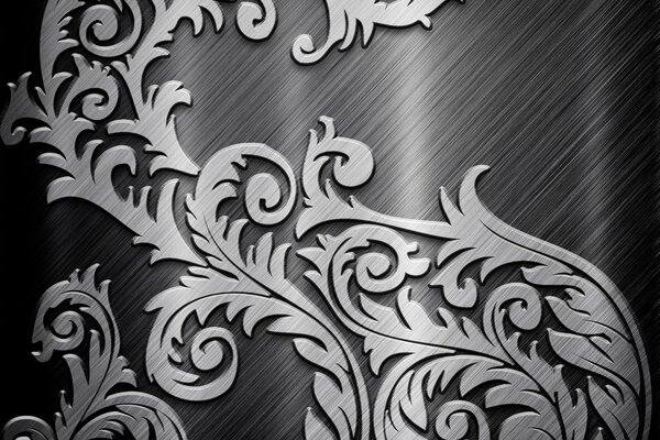 Metallic grey pattern on a grey background