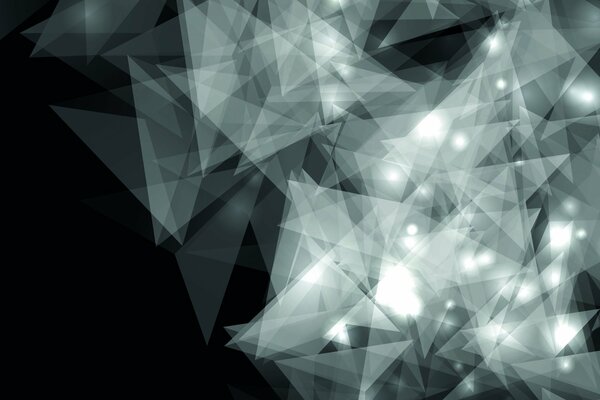 Świecące kropki na szklanych trójkątnych kształtach