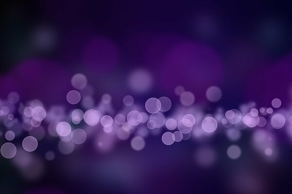 A path of bubbles on a dark purple background