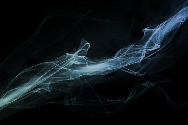 Abstract haze of cold fog on a black background
