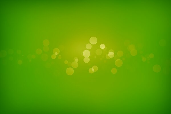 Abstraction of solar circles on a green background