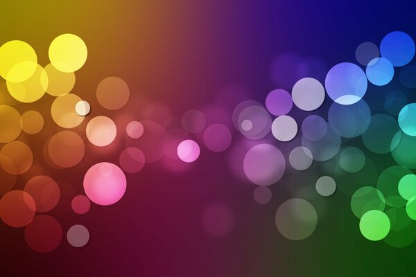 Cerchi multicolori creativi su sfondo colorato
