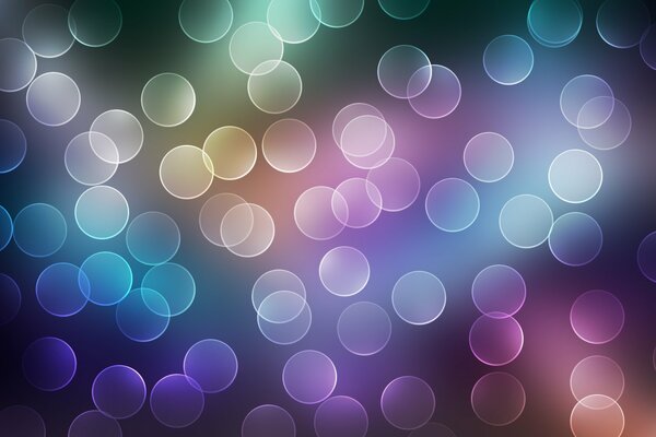 Multicolored bubbles on a dark background