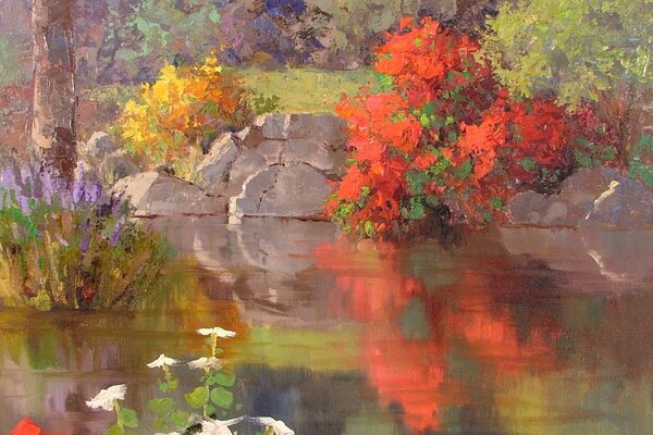 The surface of the lake with a rocky shore and flowers