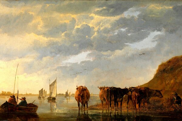 Pastore e mucche vicino al fiume