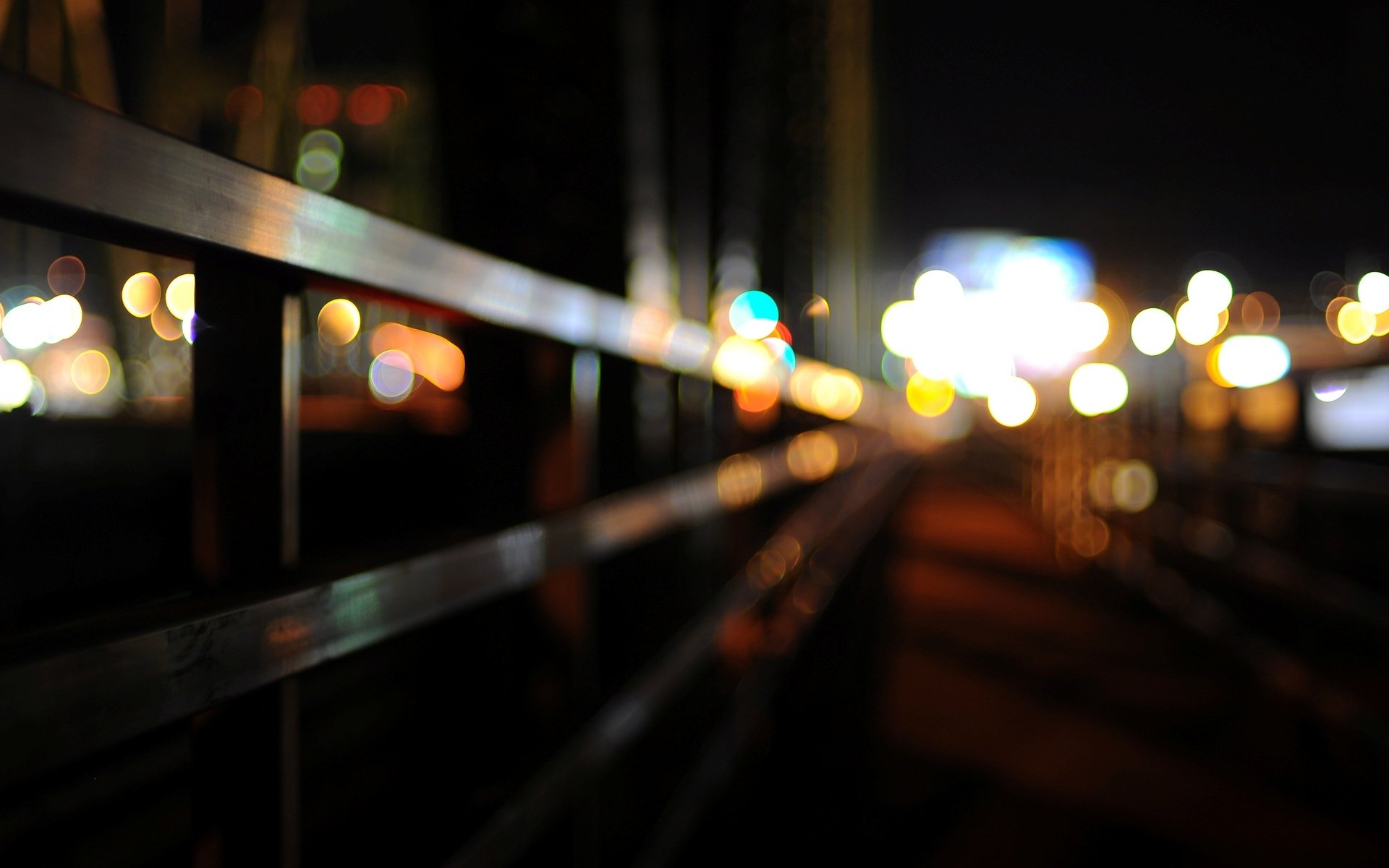 close up bokeh blur town lights fencing macro background wallpaper widescreen full screen hd wallpaper