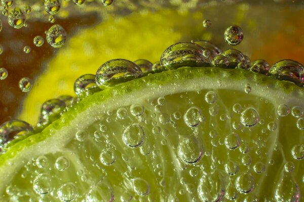 Macro photo of lime with water bubbles