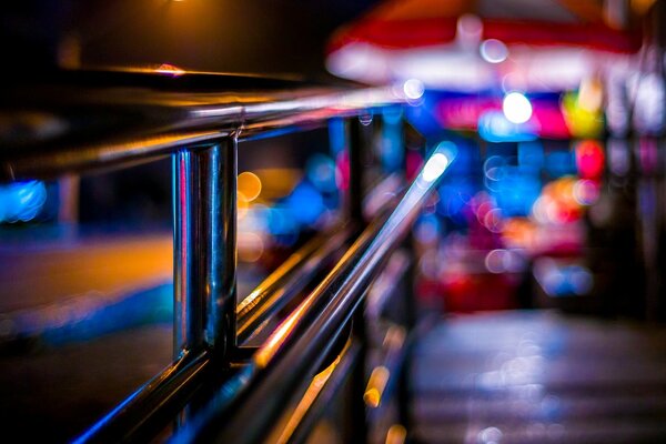 Chrome fence at night