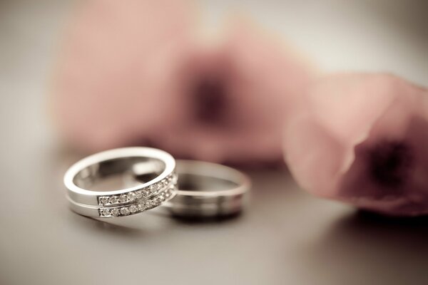 Two wedding rings on a blurry background