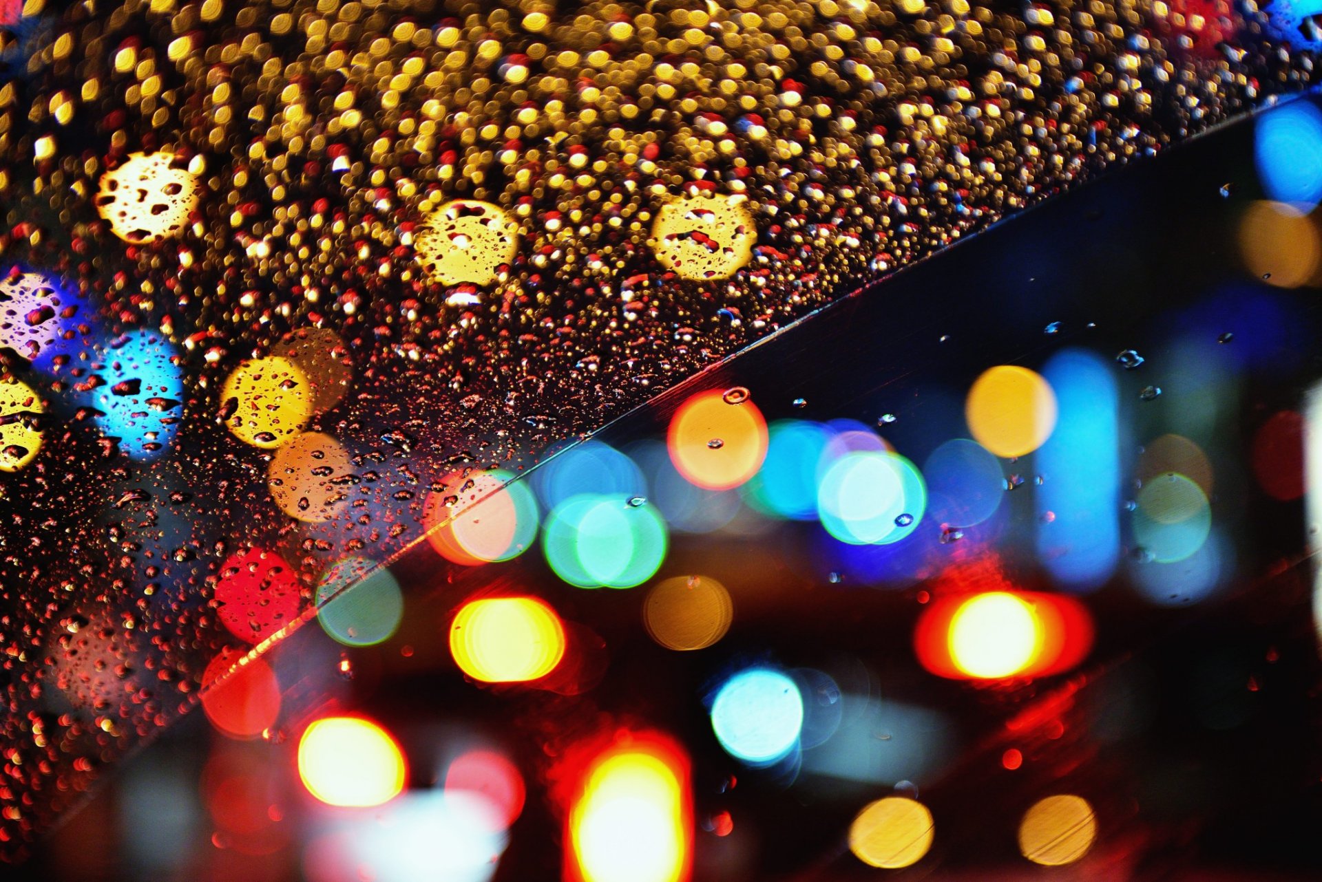 glas regen tropfen bokeh lichter nacht