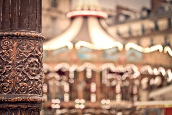 Blurred carousel with flashlights in Paris