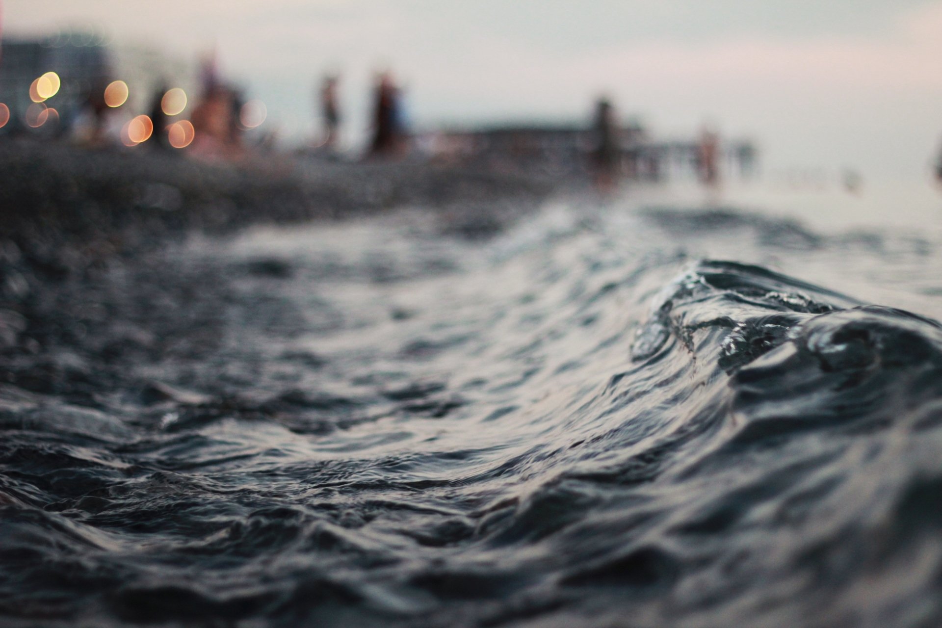 macro agua olas noche horizonte luces bokeh