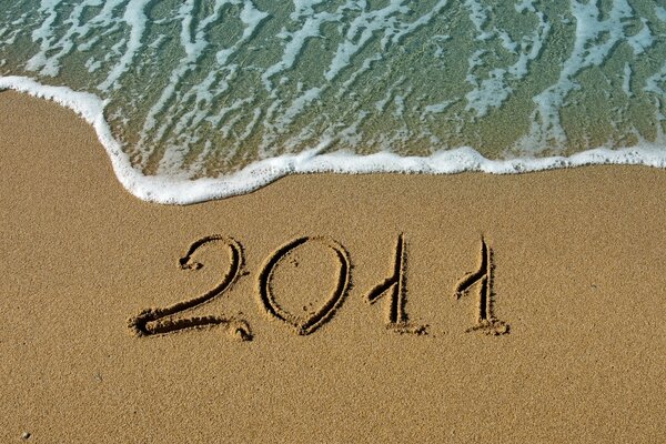 Surf inscription on the sand date