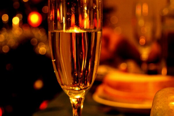 A glass of champagne in an evening setting