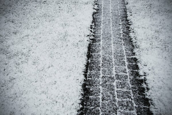 Tire track on winter road