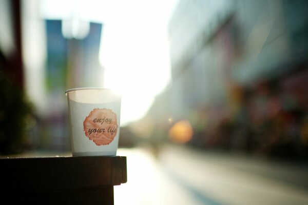 Dawn on the street and a glass of coffee