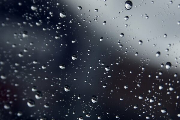 Water drops on transparent glass