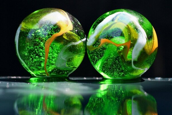 A pair of glass multicolored balls