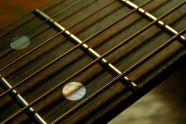 Brown guitar with five strings