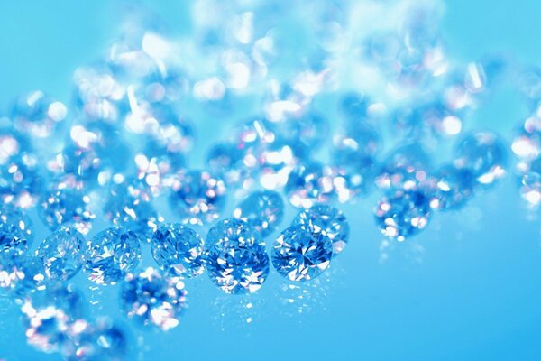 A scattering of diamonds on a blue background