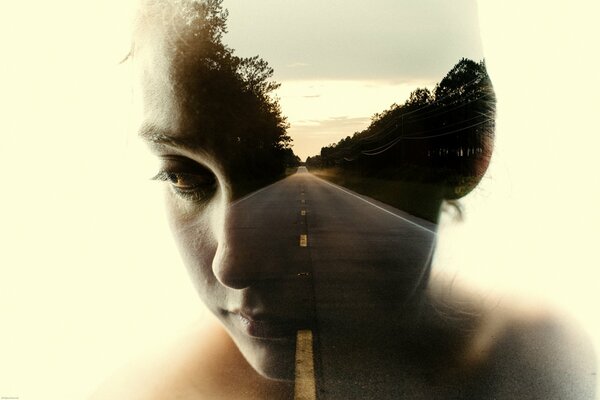 Girl on the background of the road