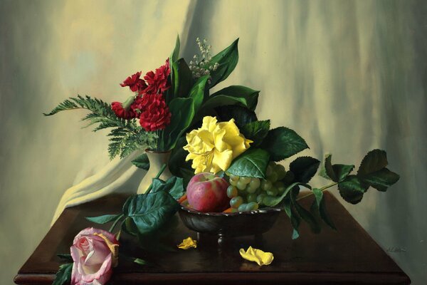 Still life on the table of berries, flowers, fruits and ferns