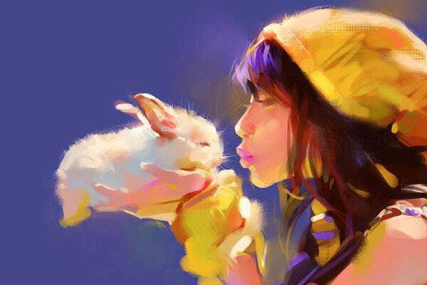 Dziewczyna całuje puszystego królika