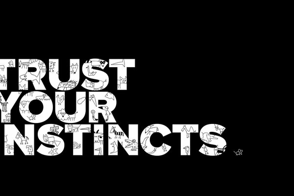 Trust your instincts inscription on a black background