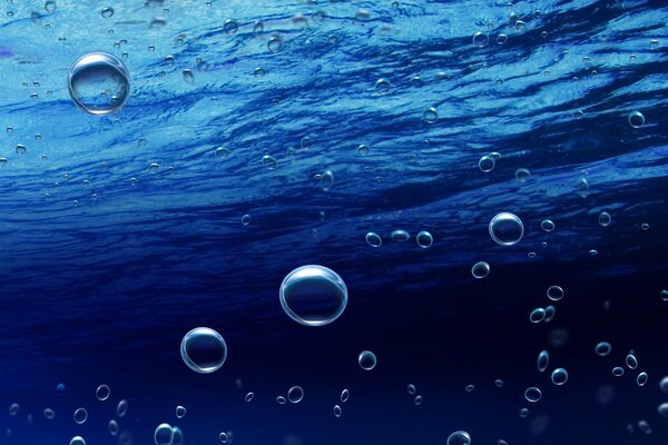 Bubbles in the water. The Blue Sea