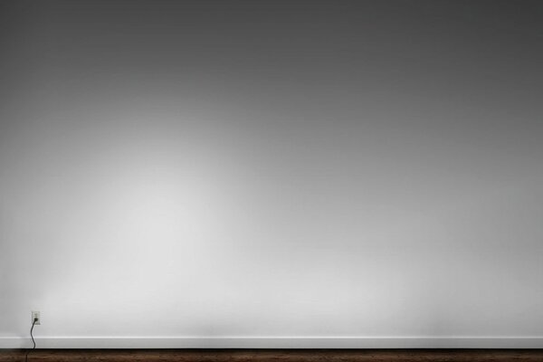 A white rosette on a gray-white wall