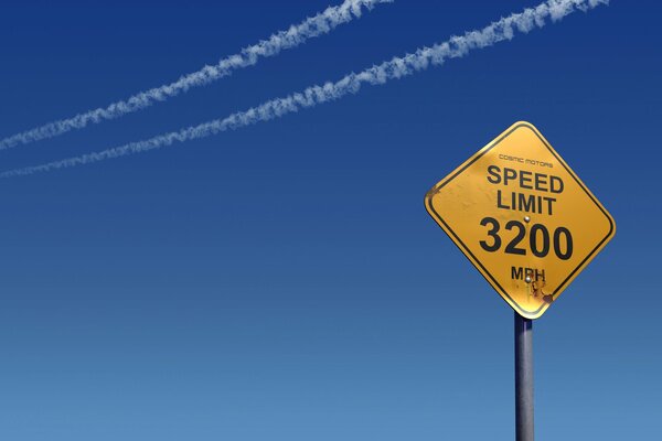 Speed sign and blue sky