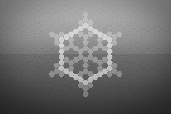 Abstract snowflake pattern on a gray background