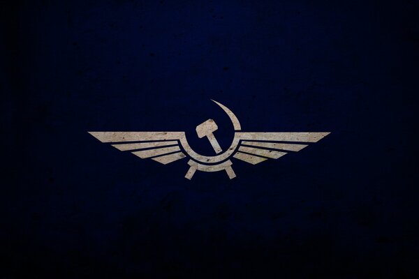 The emblem is a hammer and sickle with wings