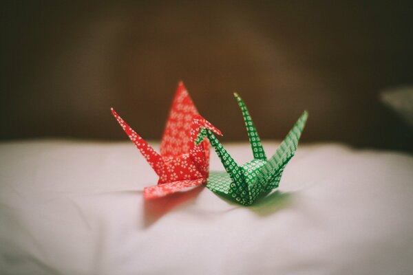Colorful origami paper in the form of cranes