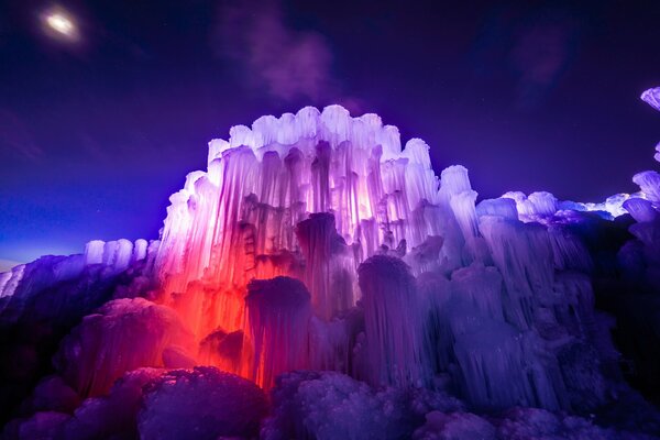 An ice mountain with a red purple glow