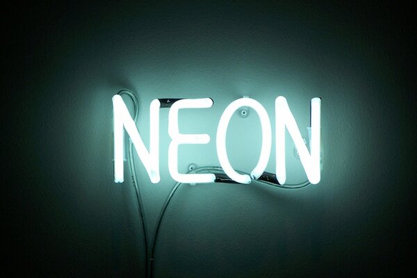 Neon lettering on a black background