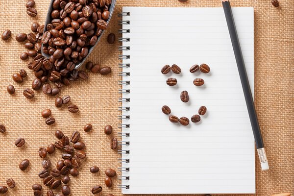 Sorriso al mattino dai chicchi di caffè