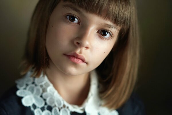 Portrait of a beautiful brown-eyed girl