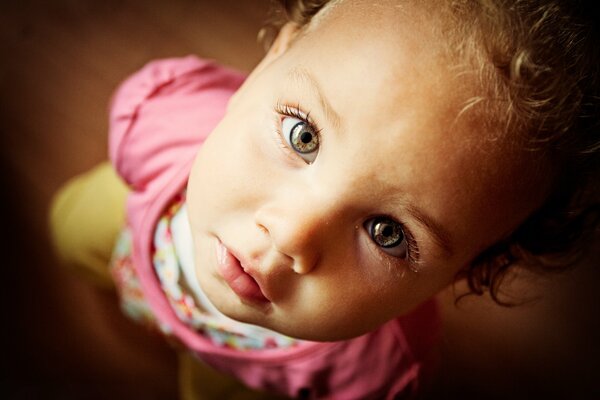 Beautiful look of a girl with curls