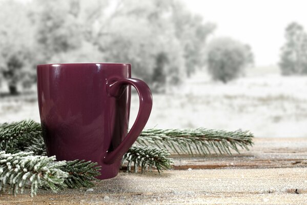 A cup of coffee against the background of nature