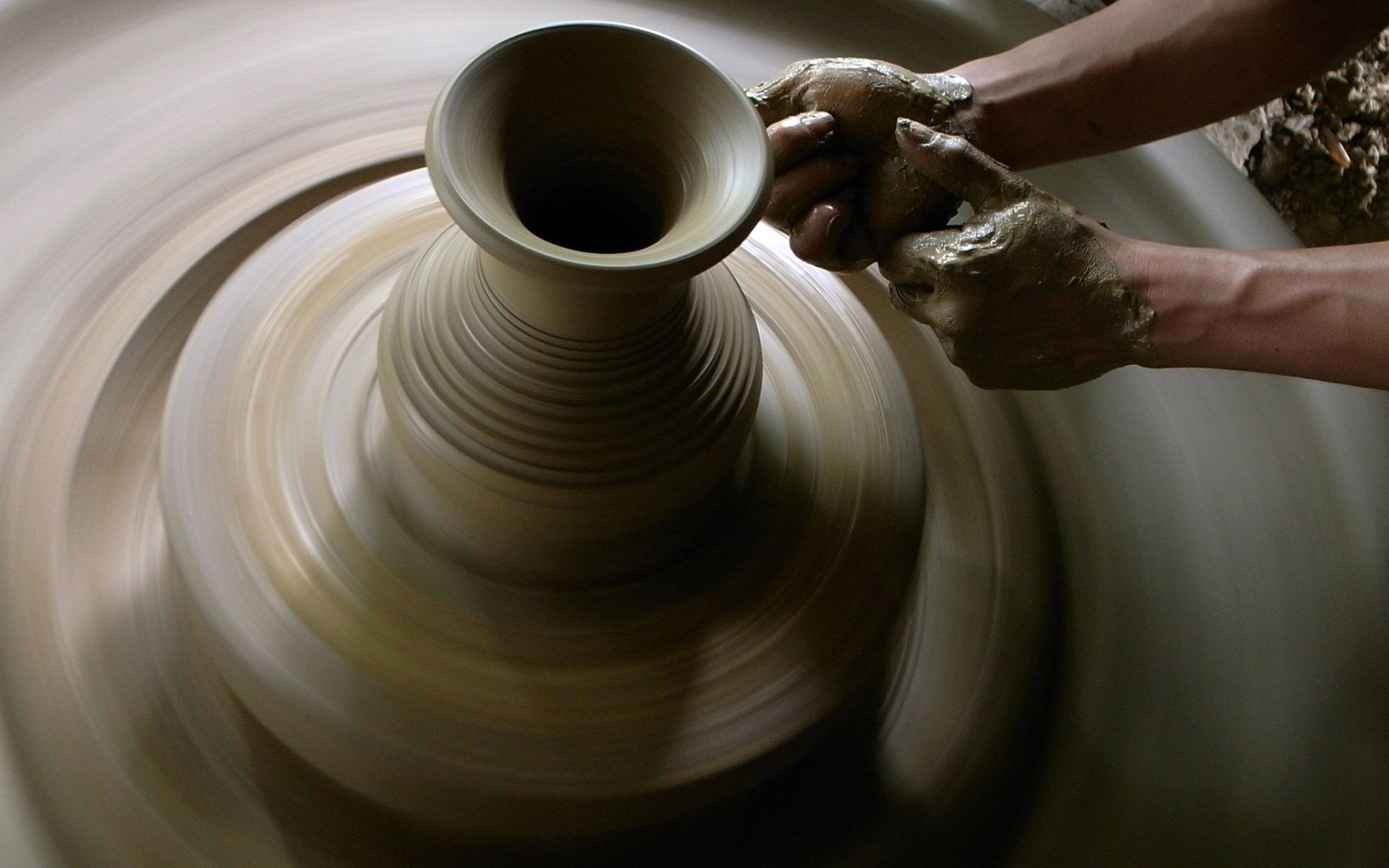 clay pitcher hands photo