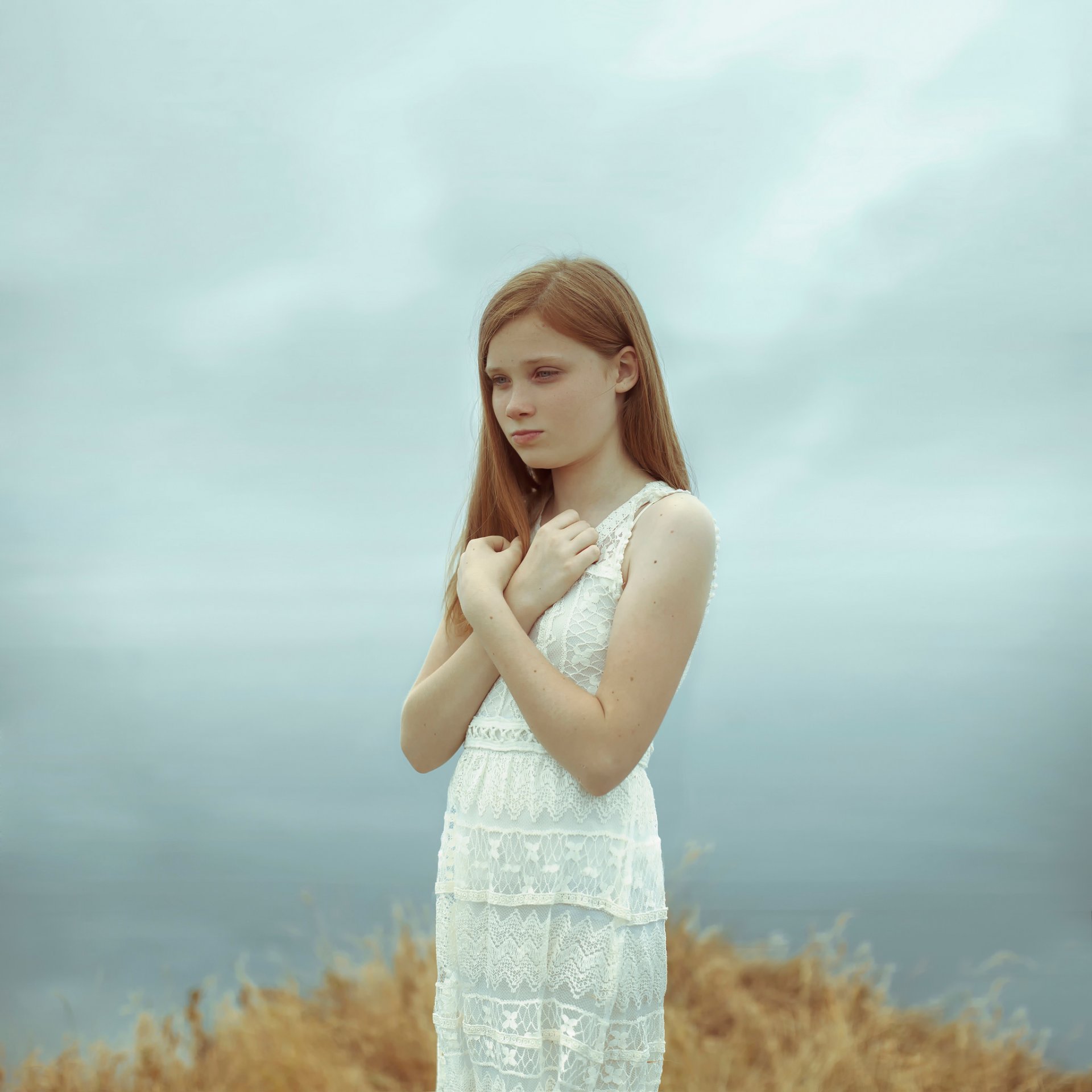 red hair girl thoughtful